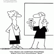 Any chance you could learn PowerPoint before your next presentation, Jim? puppets, software, meeting, learning software, technophobe, technology, technophobia, business cartoons.